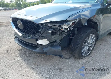 2021 Mazda Cx-5 Grand Touring z USA, uszkodzony, nr VIN JM3KFBDM0M1421482